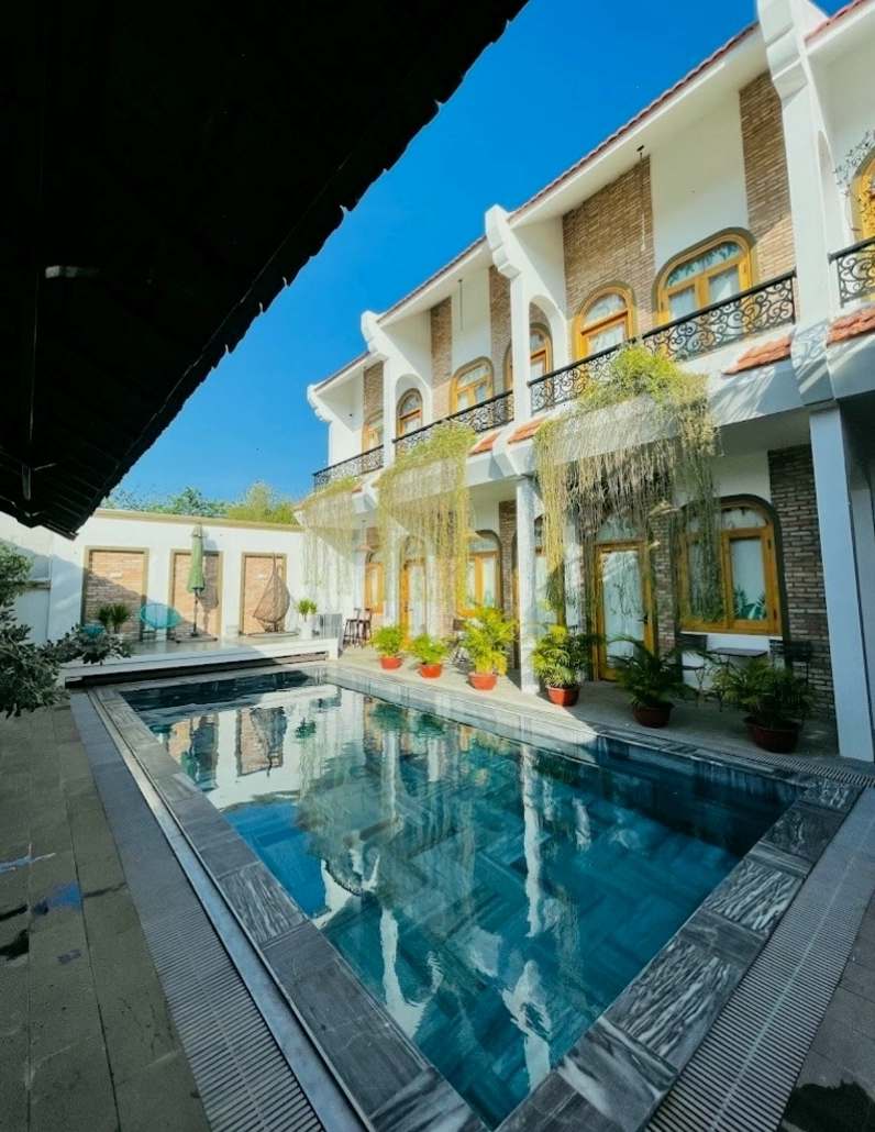 Không gian phòng nghỉ ấm cúng tại homestay Hồ Tràm