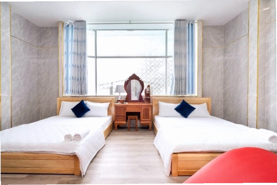 Không gian phòng ngủ ấm cúng tại một homestay ở Thủ Dầu Một