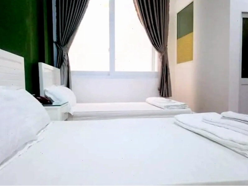 Không gian phòng ngủ tại Melody Homestay