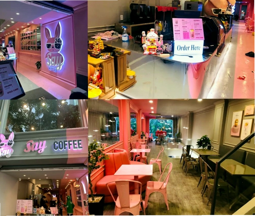 Không gian Say Coffee 24H với tông hồng và xám đặc trưng, một quán cafe 24h Quận 1