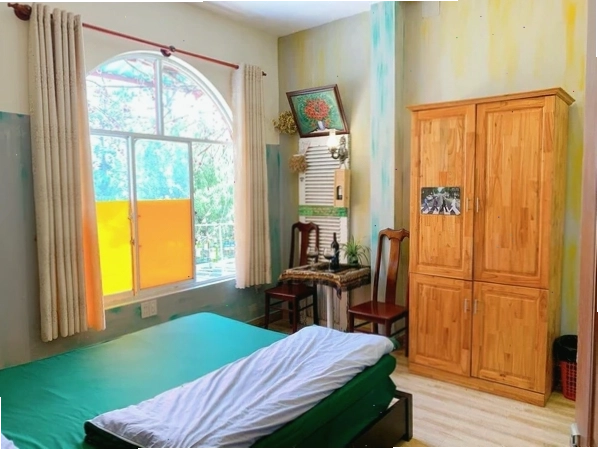 Một góc phòng nghỉ ấm cúng tại Windy Hill Homestay