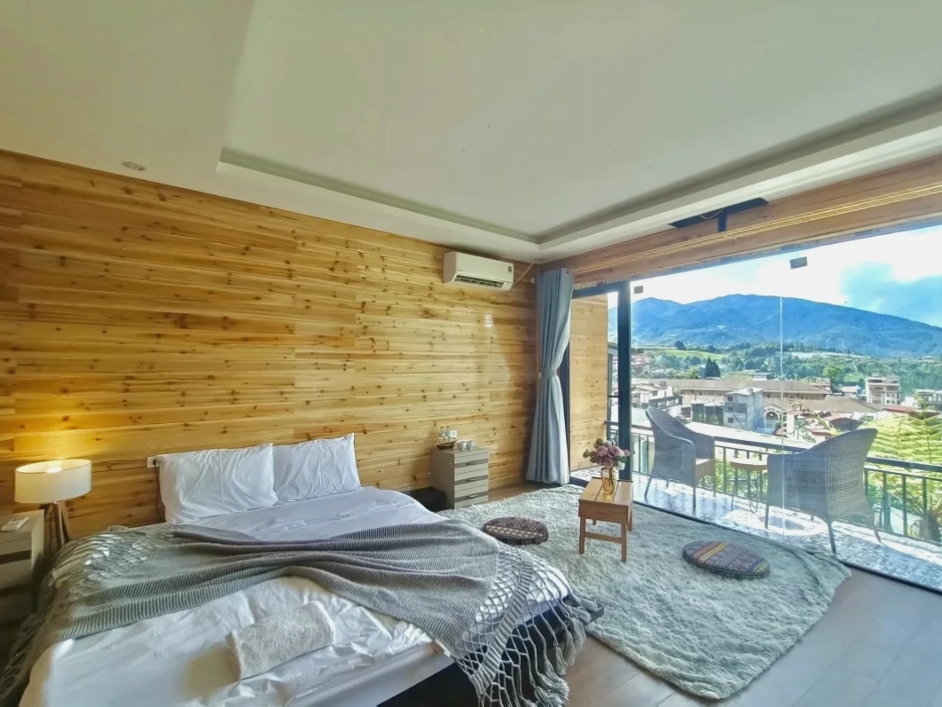 Phòng Deluxe Vườn Mây Homestay Sapa với nội thất gỗ ấm cúng