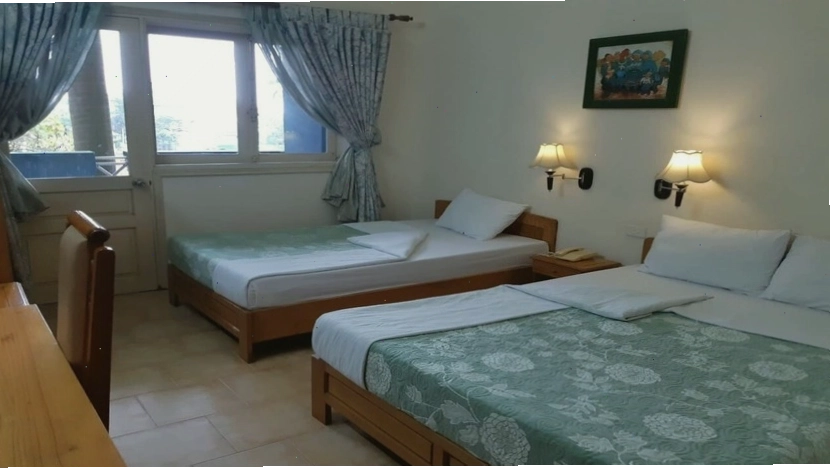 Phòng nghỉ tại Khách sạn Xanh Cửa Lò với đầy đủ tiện nghi