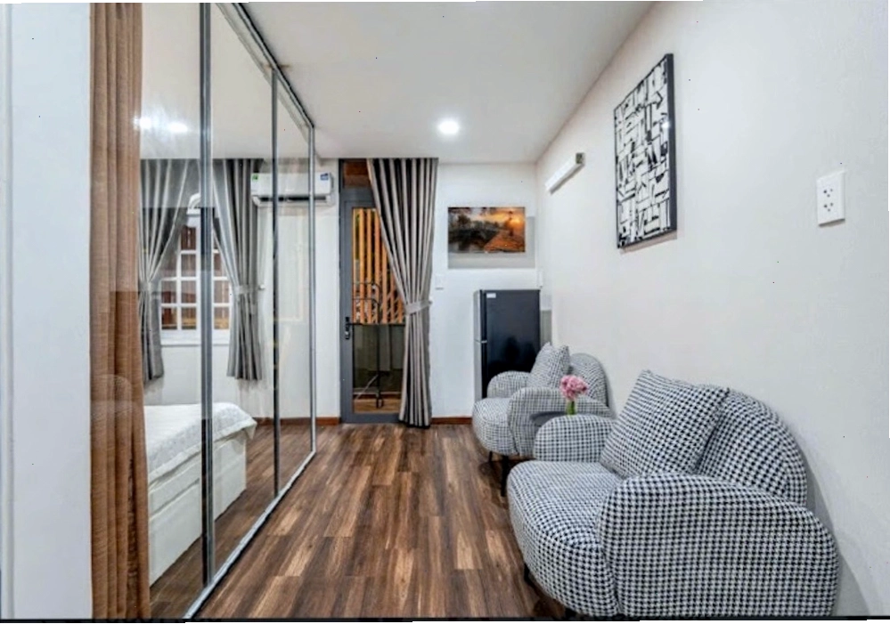 Phòng nghỉ tại New Star Inn Boutique Hotel được trang bị đầy đủ tiện nghi như tủ lạnh, điều hòa