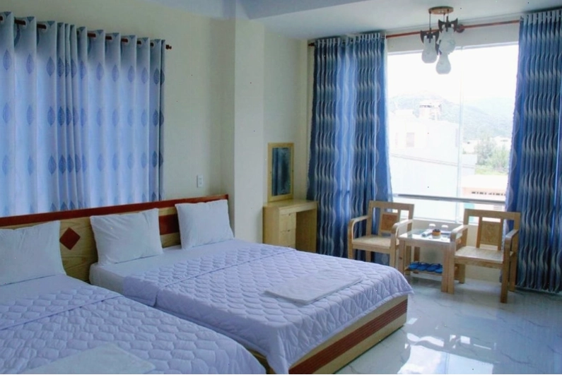 Phòng nghỉ tại Yến Vy 32 Quy Nhơn Hotel trang bị đầy đủ tiện nghi