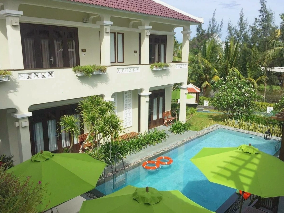 Phòng nghỉ với tông màu ấm áp tại Green Boutique Villa