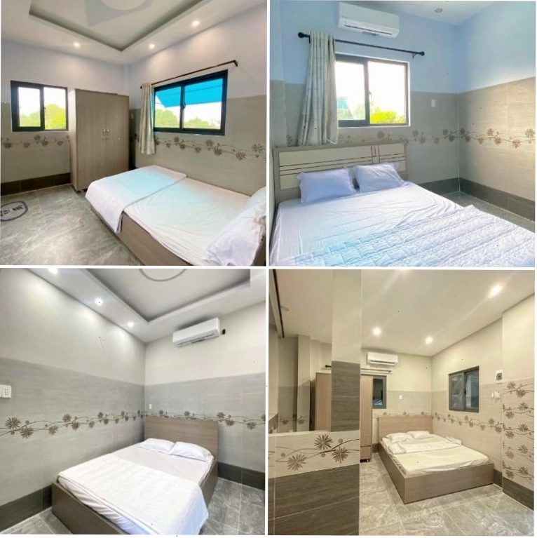 Phòng ngủ đơn giản tại Homestay Nam Sơn với view biển