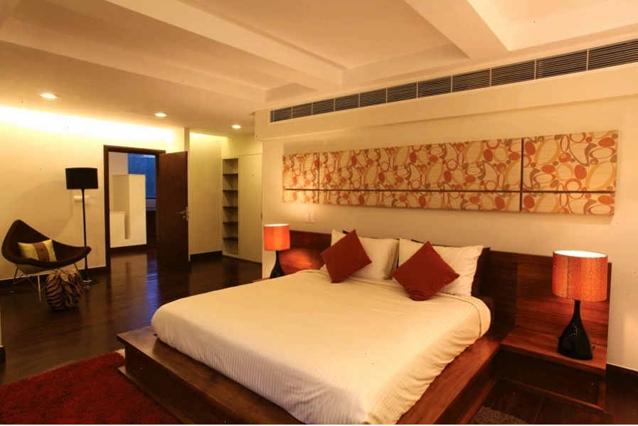 Phòng ngủ sang trọng tại Montgomerie Links Hotel & Villas