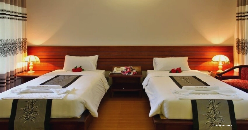 Phòng ngủ tiện nghi tại Đất Lành Resort